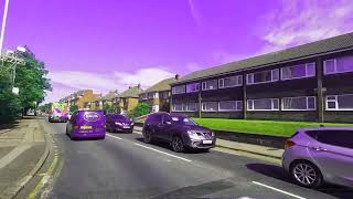 purple cars on a road with purple sky
