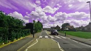 two-way road with purple sky